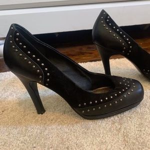 Black studded pumps